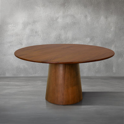 Nova 60-inch round dining table in warm mango wood on a clean pedestal base