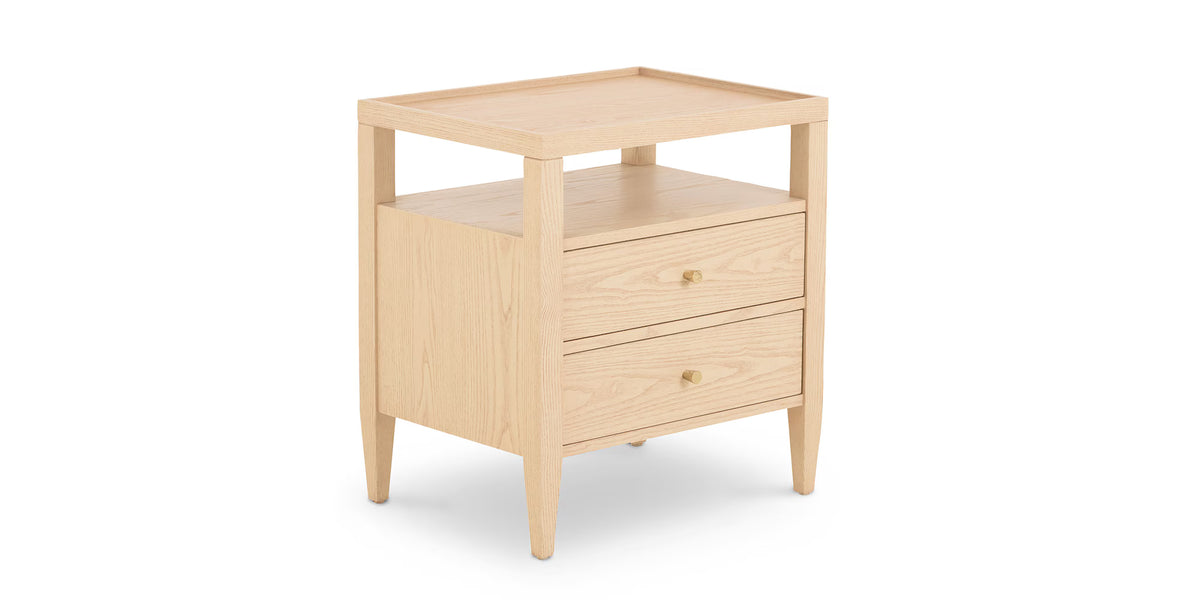 Willow nightstand in light natural wood with an open shelf over two drawers, gold knob pulls, and tapered legs, bedroom
