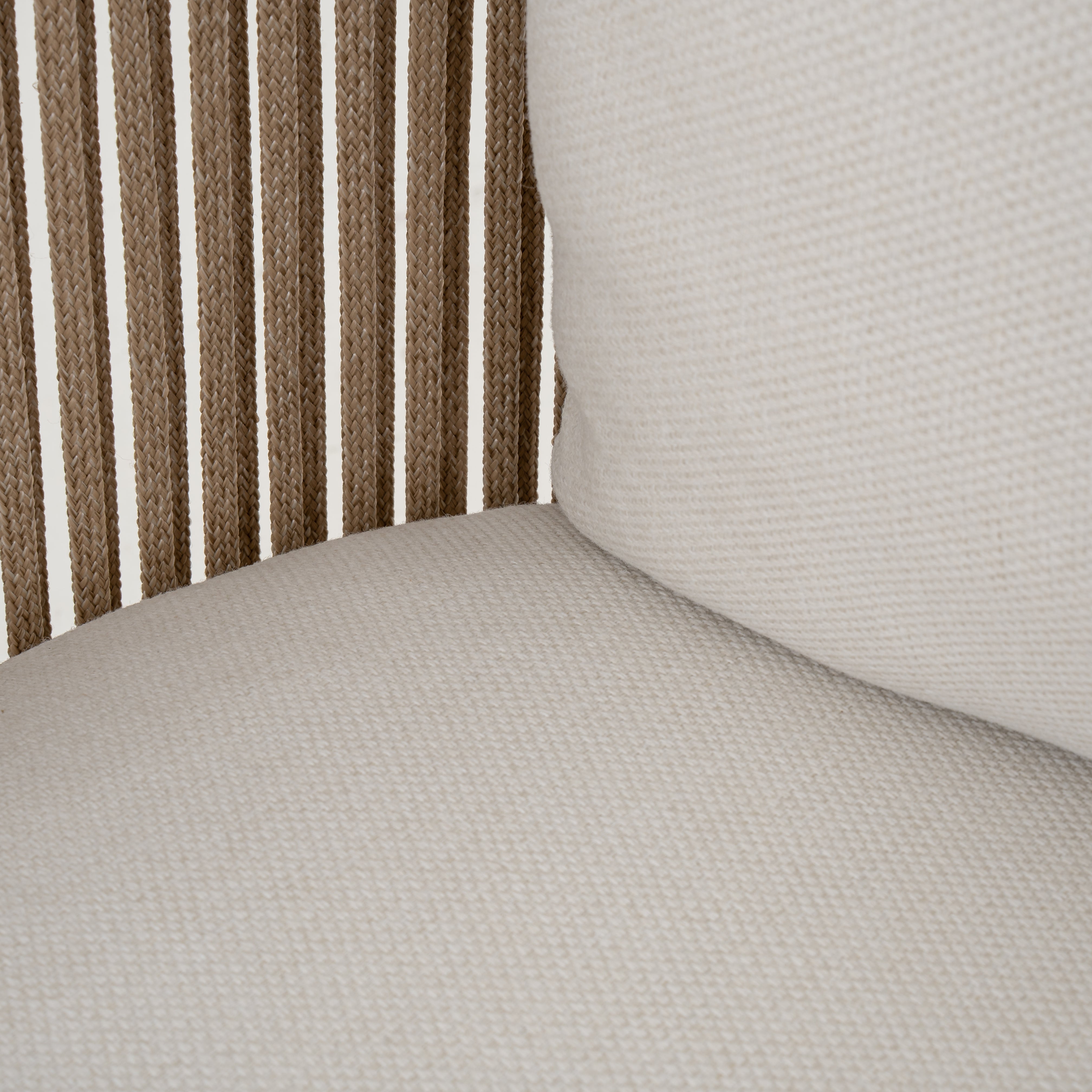 Napa outdoor accent chair with a natural wood frame, woven rope detailing, and ivory all-weather cushions, patio