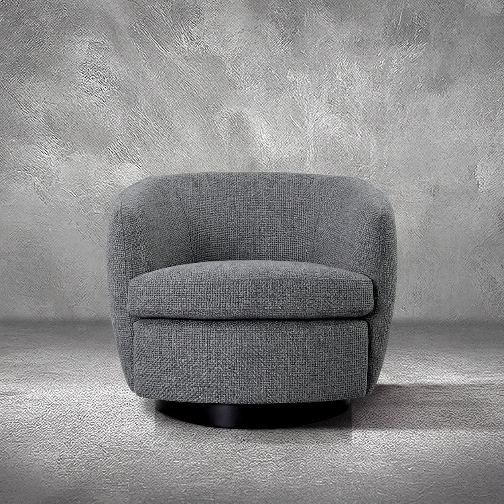Grayson gray performance fabric swivel accent chair with a barrel silhouette, loose seat cushion, and black swivel base