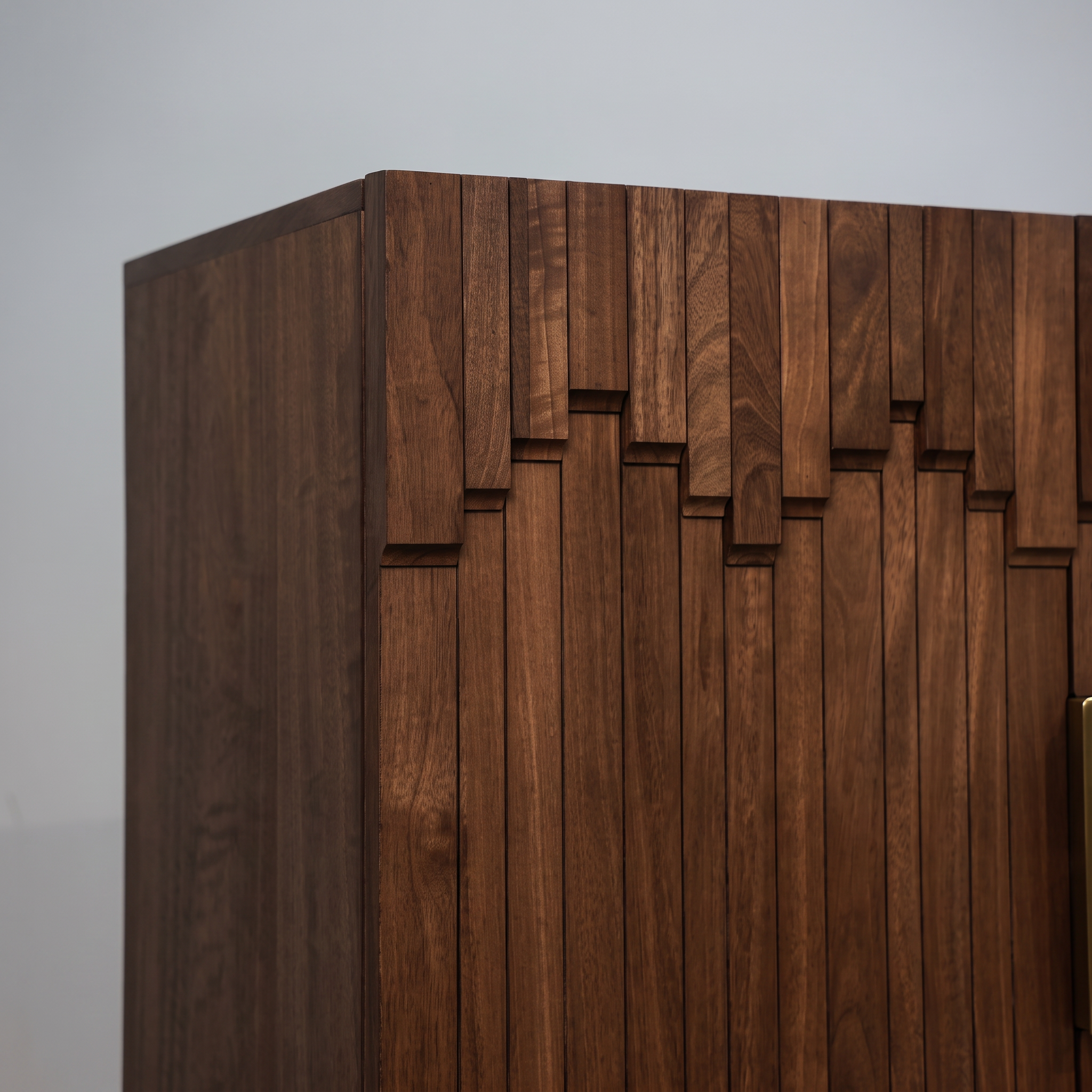 Mary credenza in solid mango wood with a sculptural block-relief front, gold bar pulls, and block feet, living room