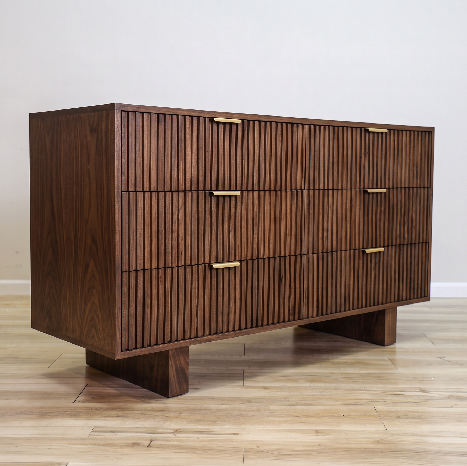 Mocha dresser in solid mango wood with six fluted drawer fronts, gold bar pulls, and two solid block feet, bedroom