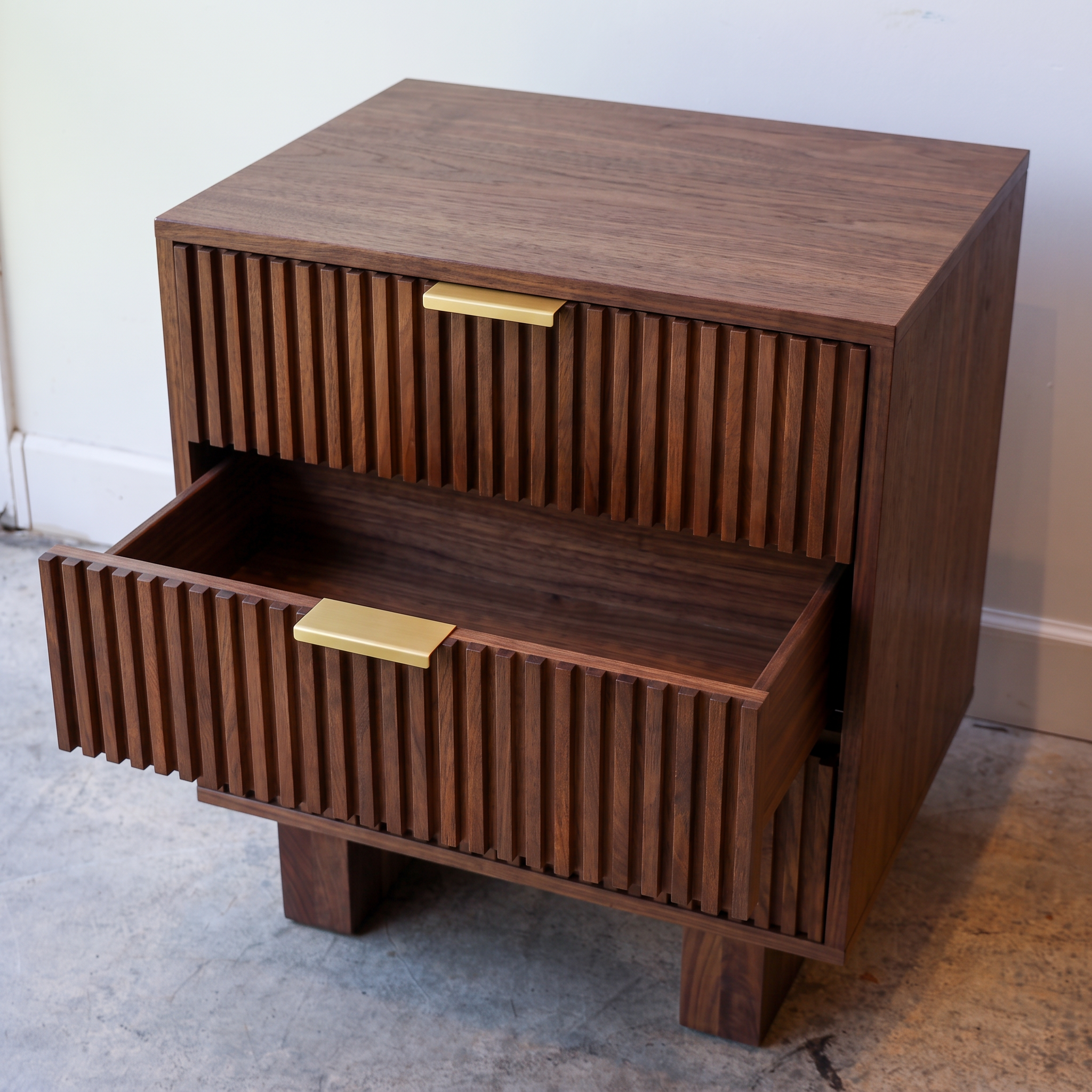 Mocha nightstand in solid mango wood with three fluted drawers, gold bar pulls, and two solid block feet, bedroom