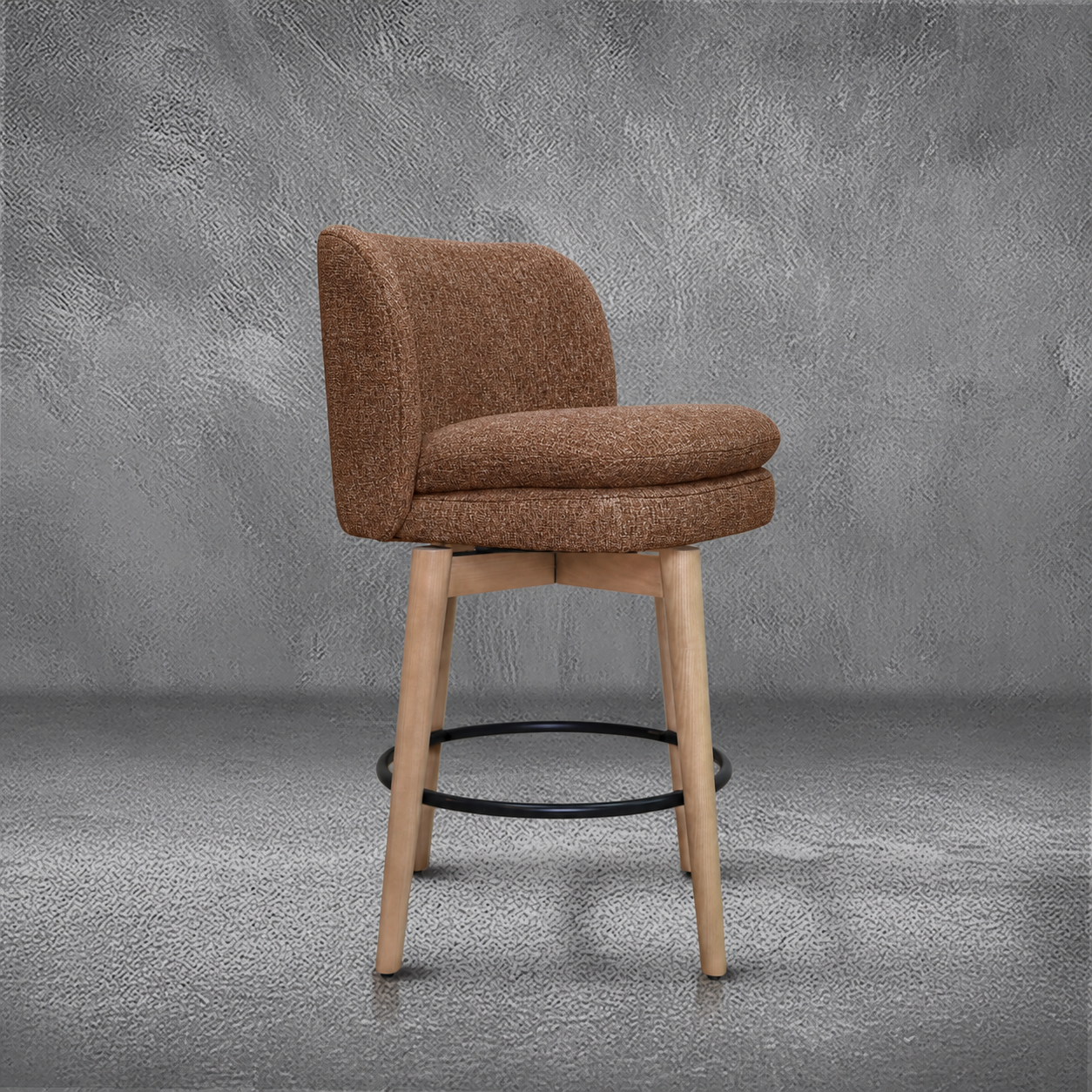Elmer counter stool in rust performance fabric with a low wraparound back, natural wood legs, and a black ring footrest, kitchen counter