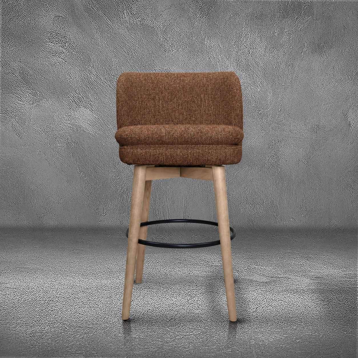 Elmer barstool in rust performance fabric with a low wraparound back, natural wood legs, and a black ring footrest, kitchen bar