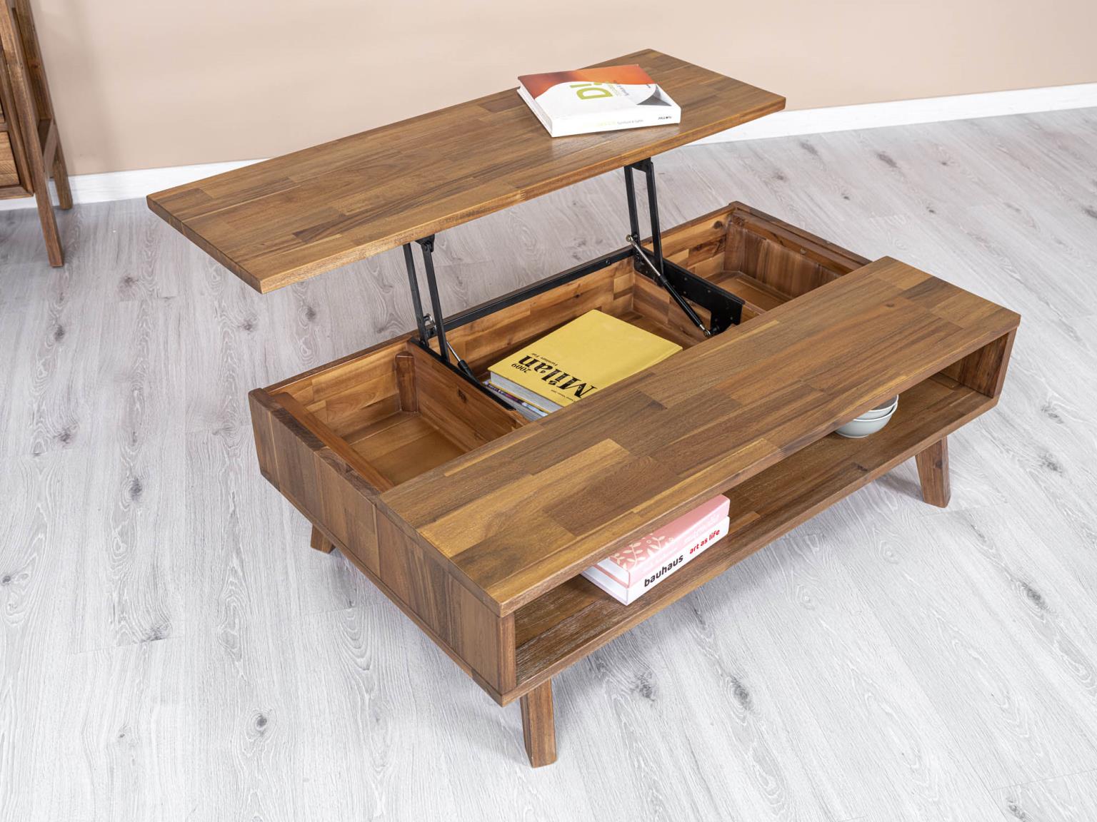 Reunion Lift Top Coffee Table in warm natural acacia wood, showing the open front storage cubby and mid-century splayed legs