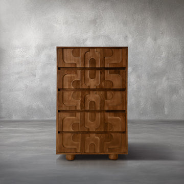 Funky Chest, tall warm mango wood chest with sculptural 3D carved drawer fronts, in a bedroom