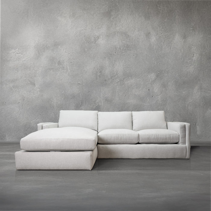 The Amalfi Sectional, a performance-fabric deep-seated chaise sectional, in a living room