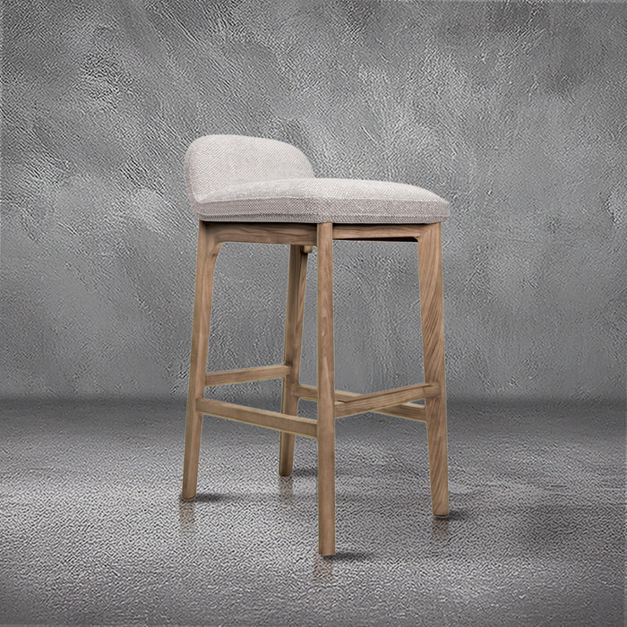 Asher barstool in beige performance fabric with a low back and natural wood legs with stretchers, kitchen bar