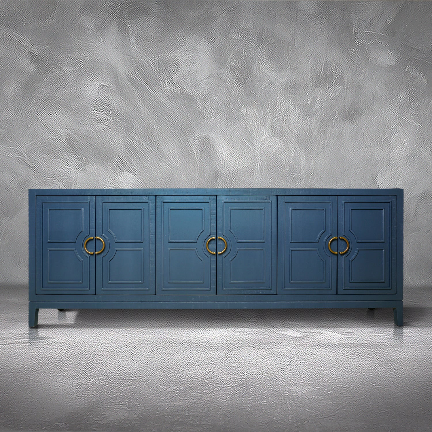 David 90-inch blue credenza in solid Mexican pine with six geometric panel doors and gold ring pulls, living room