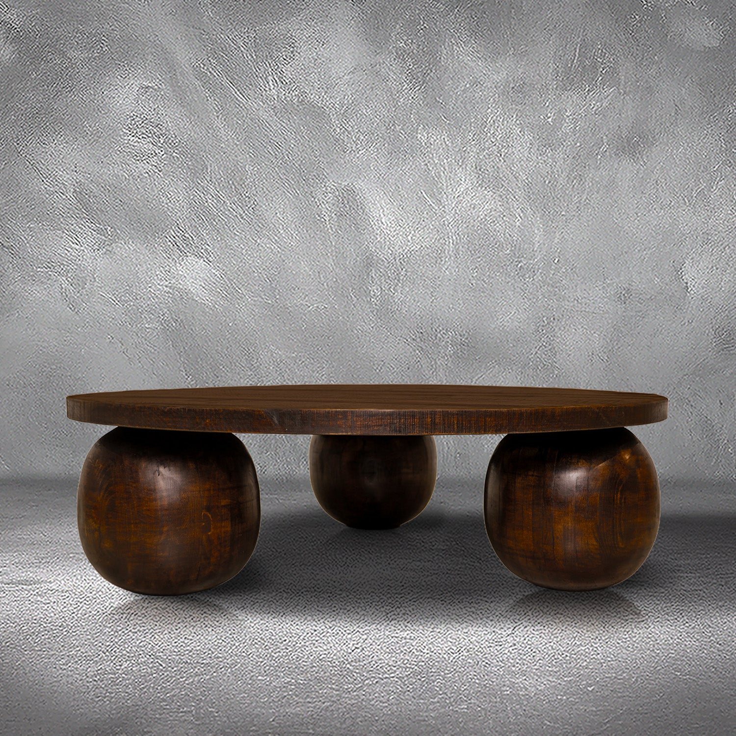 Fernandez round coffee table in solid Mexican pine with three spherical wood ball feet, living room