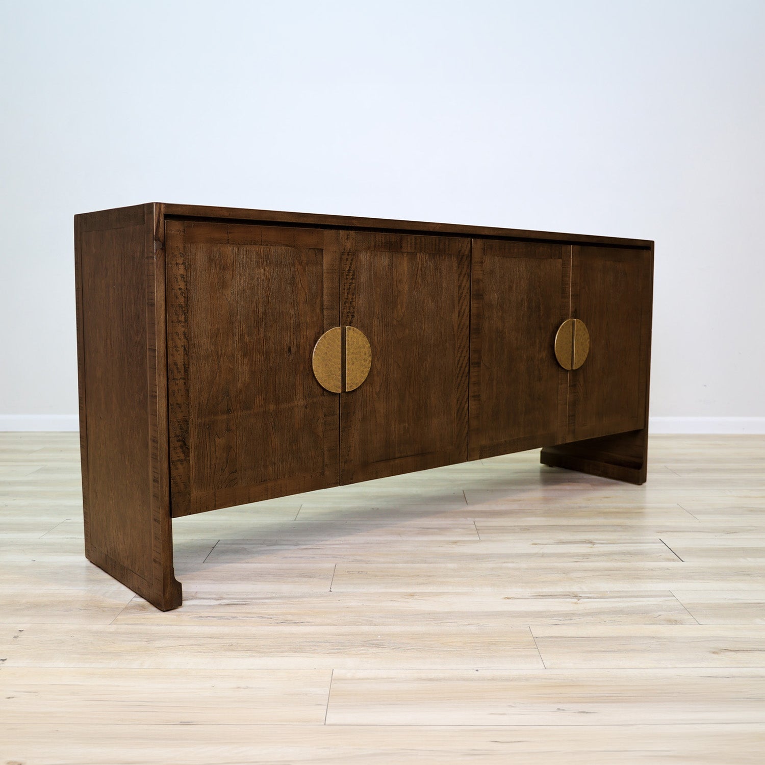 Jorge credenza in solid Mexican pine with four doors and split hammered-gold circle pulls, living room
